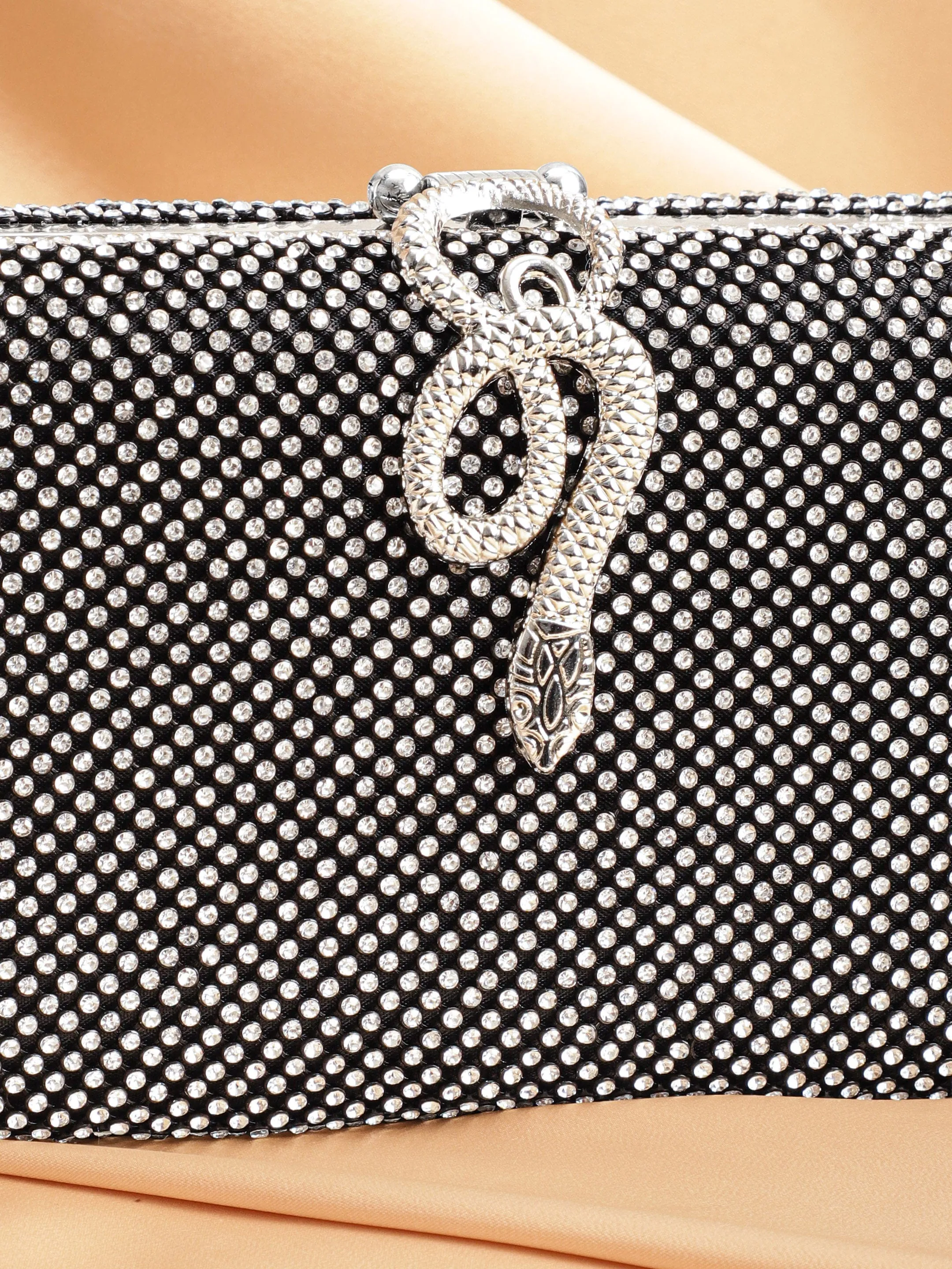 Rubans Grey With Dazzling Crystal Zirconia Embellished Serpent motif Clutch handbag